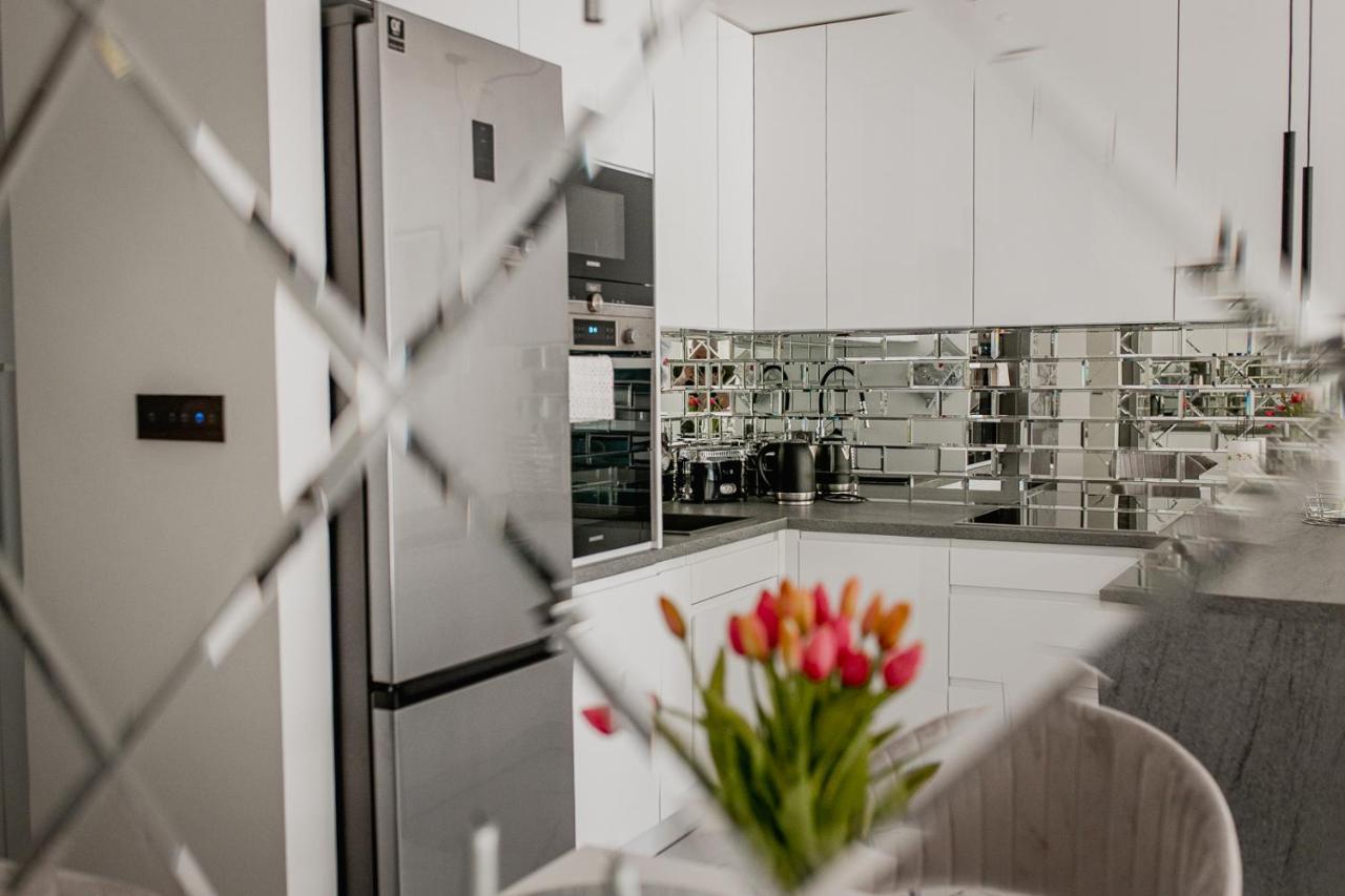 Apartament Villa Klar Ostroda Bagian luar foto